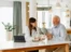 A man and a woman sitting at a table.