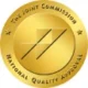 A gold medal with the words "National Quality Award."