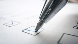 Blue Pen with Check Mark 